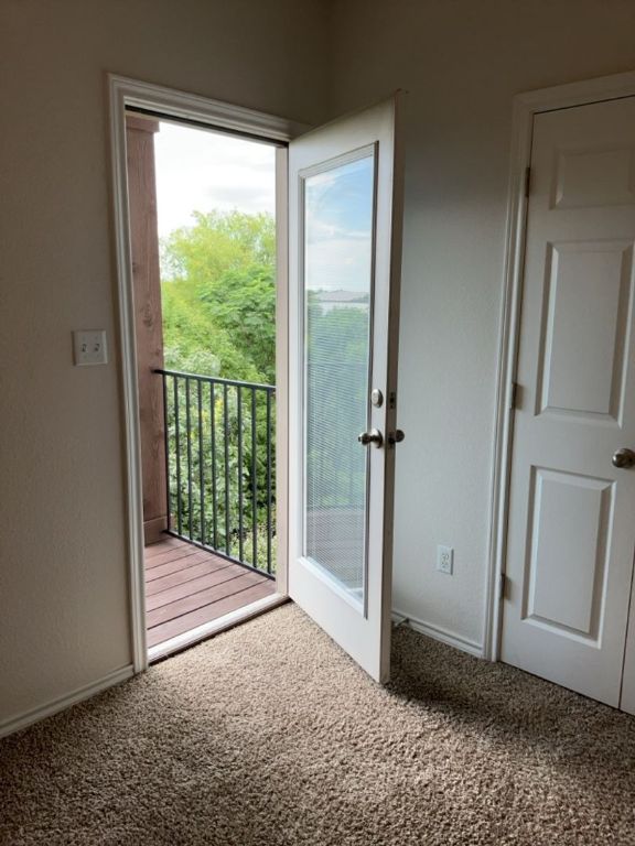 2105 Town Centre Drive, Unit 28 Round Rock, TX 78664 - Photo 21 of 28 Balcony off primary bedroom
