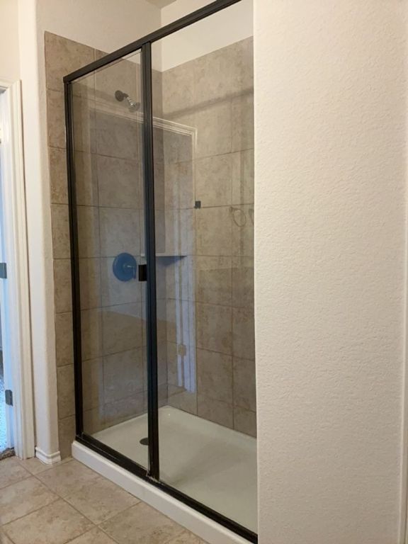 2105 Town Centre Drive, Unit 28 Round Rock, TX 78664 - Photo 25 of 28 Full bath featuring a shower stall