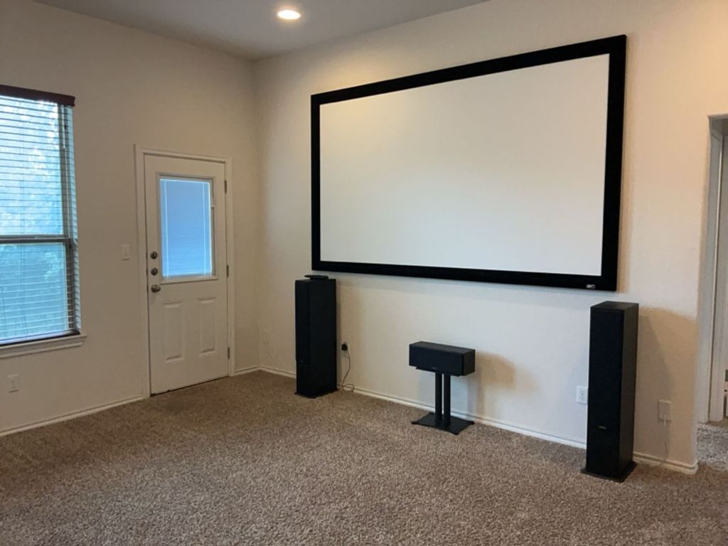 2105 Town Centre Drive, Unit 28 Round Rock, TX 78664 - Photo 3 of 28 Carpeted media room with baseboards and recessed lighting