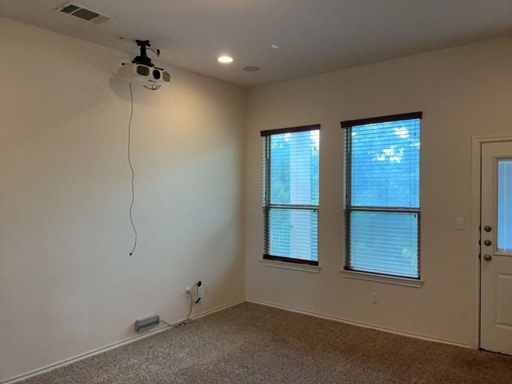 2105 Town Centre Drive, Unit 28 Round Rock, TX 78664 - Photo 4 of 28 Carpeted media room