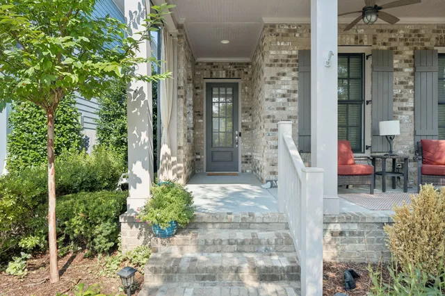 a front view of a house with a porch