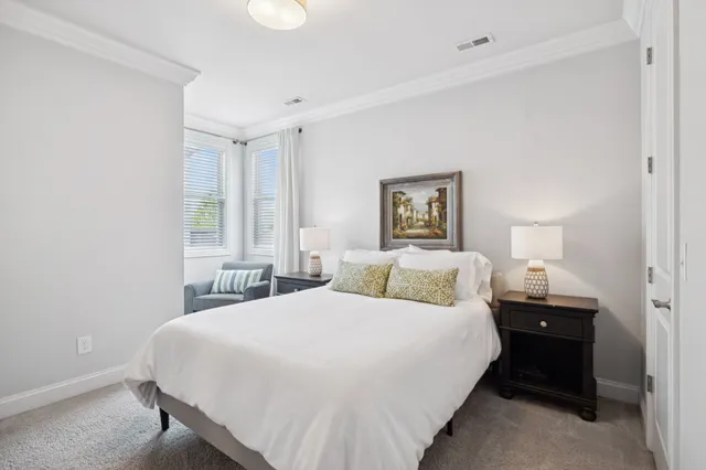 a living room with furniture workspace and a flat screen tv