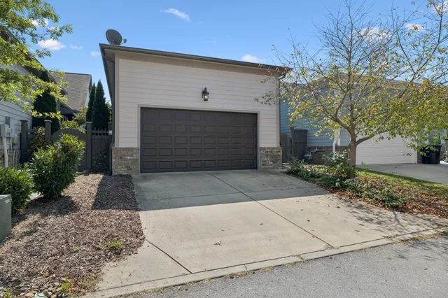 a view of lake and houses with outdoor space