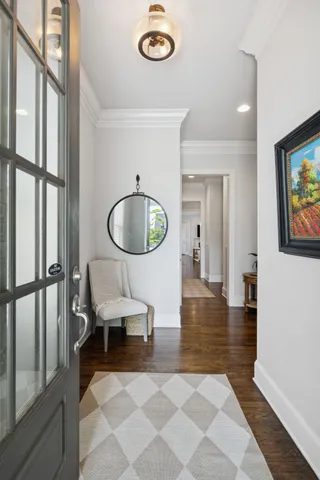 a kitchen with stainless steel appliances granite countertop a sink refrigerator and cabinets