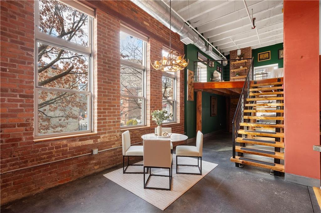 1536 Colwell Street, Unit 4 Pittsburgh, PA 15219 - Photo 11 of 43 a outdoor living space with furniture and a window