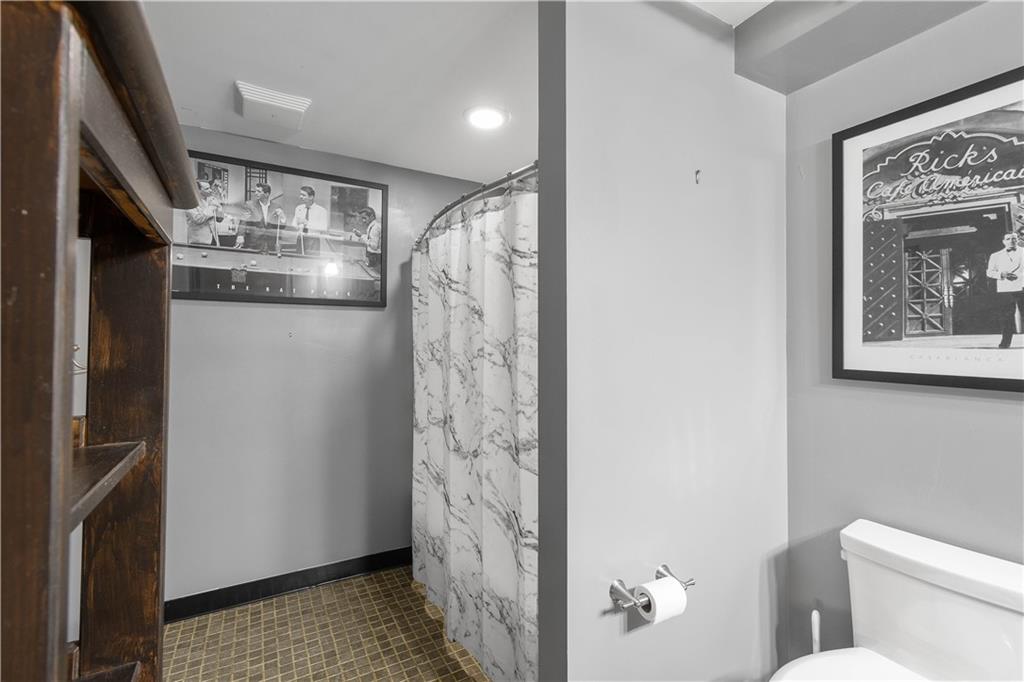 1536 Colwell Street, Unit 4 Pittsburgh, PA 15219 - Photo 16 of 43 a bathroom with a shower and a toilet