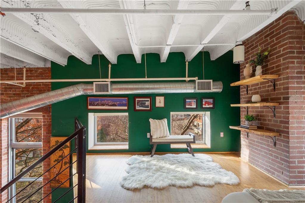 1536 Colwell Street, Unit 4 Pittsburgh, PA 15219 - Photo 20 of 43 a view of a chairs and table in a patio