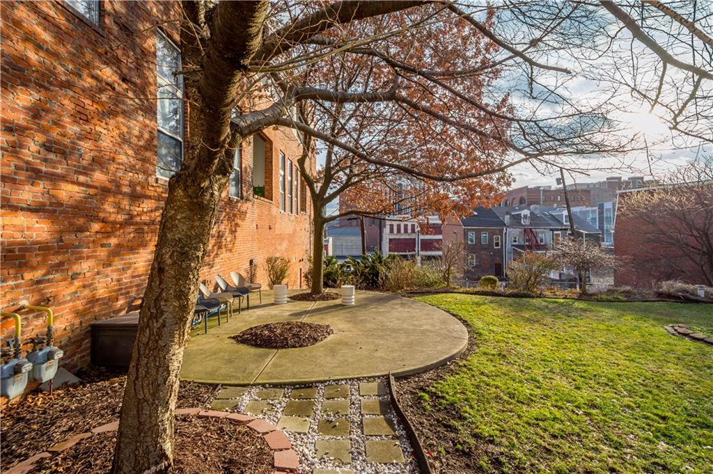 1536 Colwell Street, Unit 4 Pittsburgh, PA 15219 - Photo 30 of 43 a view of a swimming pool with a backyard