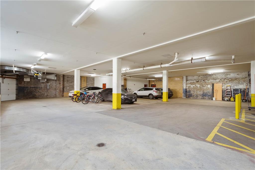 1536 Colwell Street, Unit 4 Pittsburgh, PA 15219 - Photo 36 of 43 a view of a livingroom with furniture and a garage