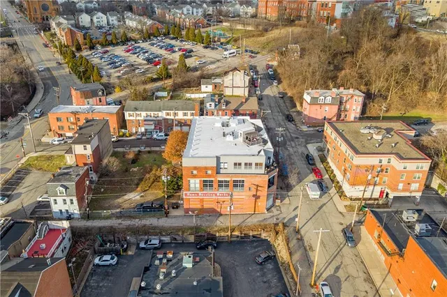 an aerial view of a city with lots of residential buildings