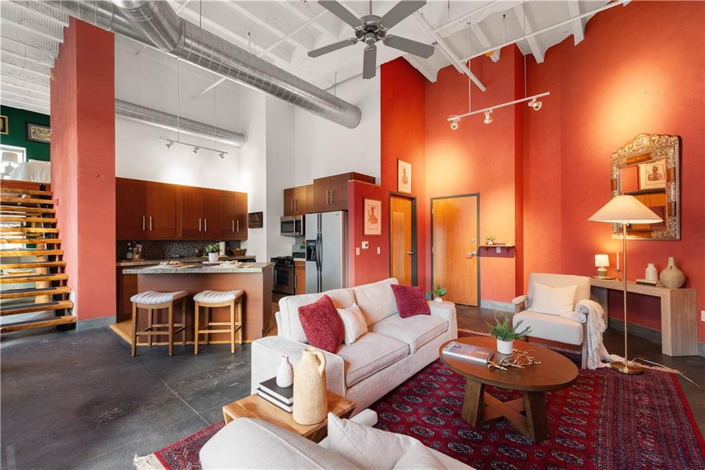 1536 Colwell Street, Unit 4 Pittsburgh, PA 15219 - Photo 4 of 43 a living room with furniture and wooden floor
