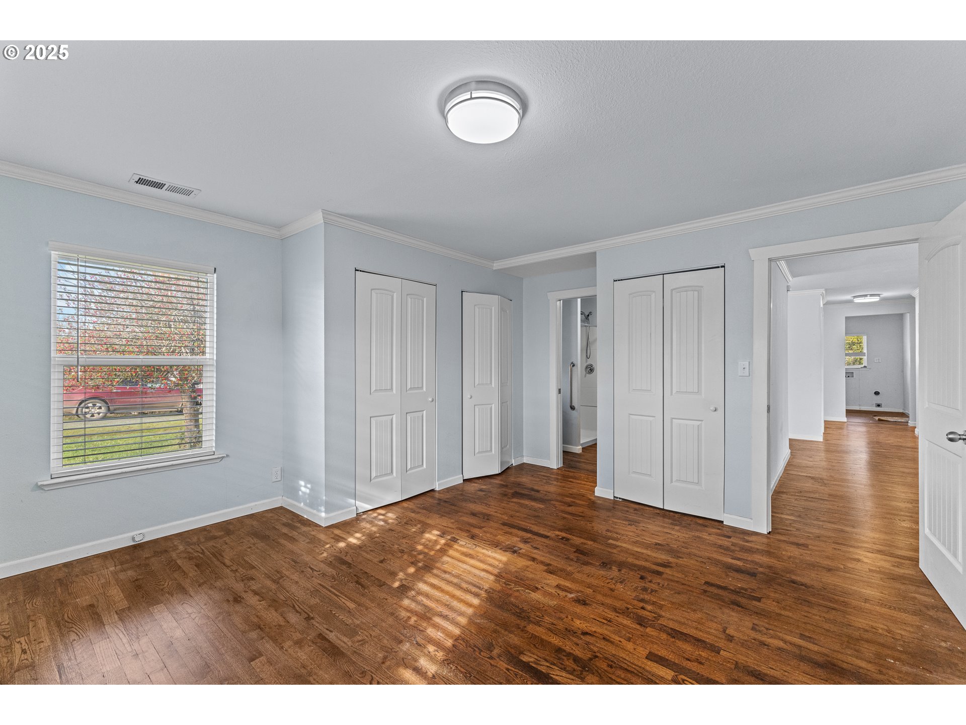 1713 Maple Street Myrtle Point, OR 97458 - Photo 14 of 43 a view of an empty room with wooden floor and a window
