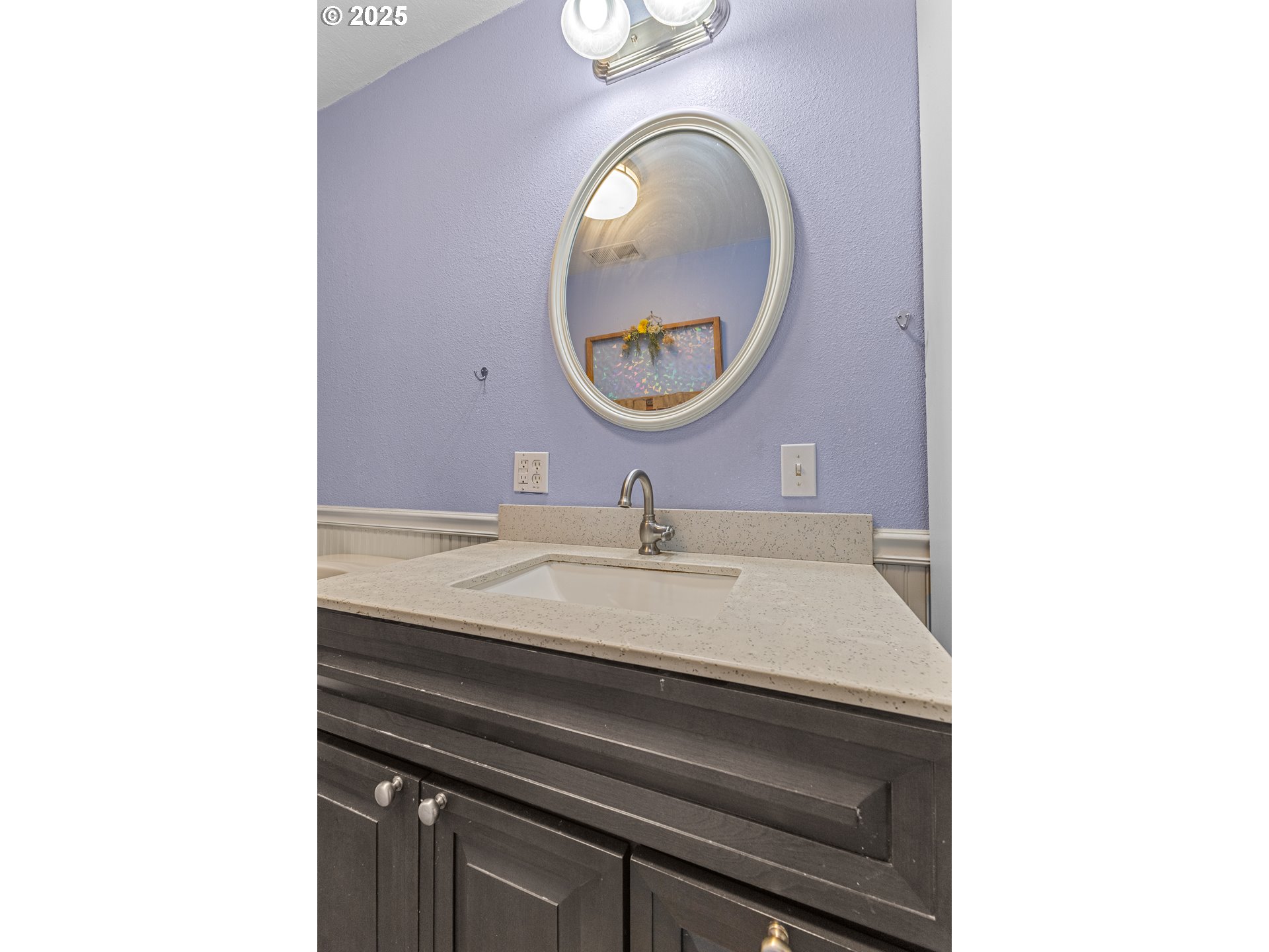 1713 Maple Street Myrtle Point, OR 97458 - Photo 21 of 43 a bathroom with a sink and a mirror