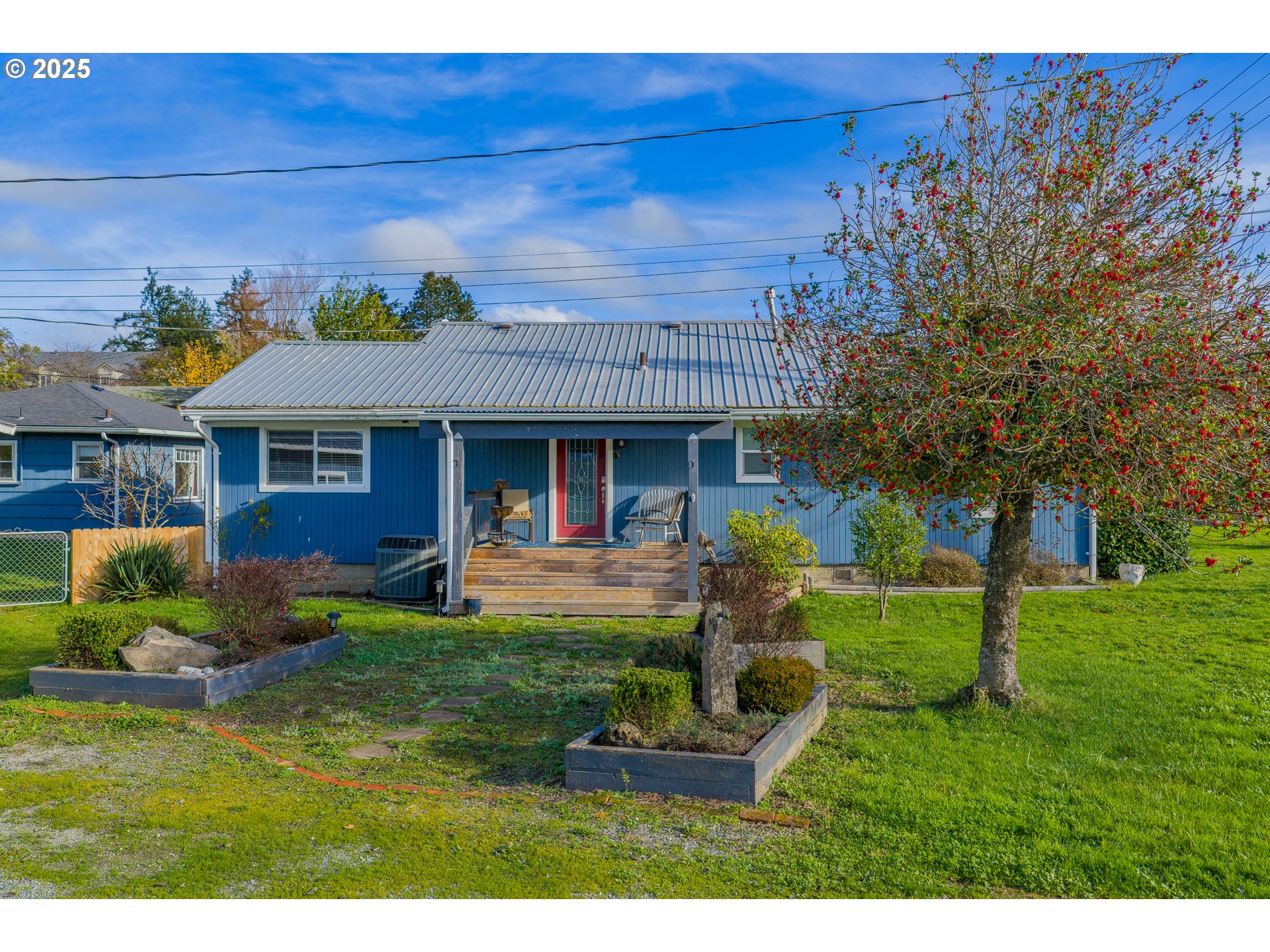 1713 Maple Street Myrtle Point, OR 97458 - Photo 42 of 43 a view of a house with a yard porch and sitting area