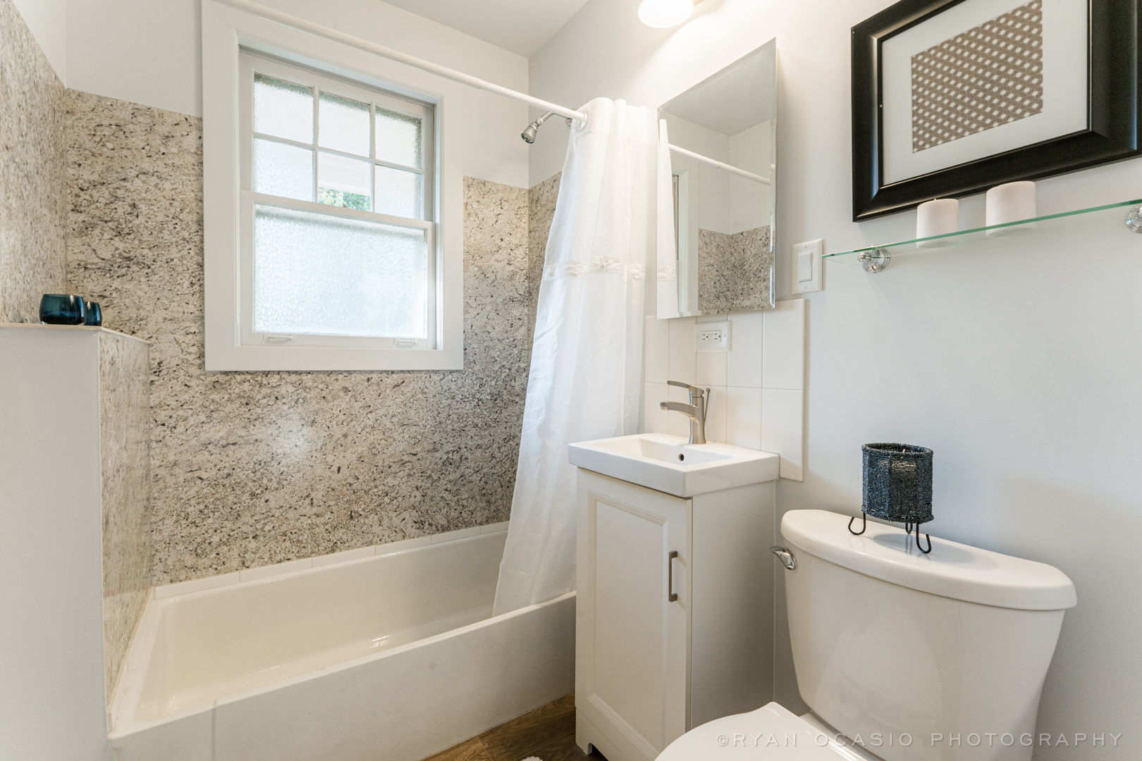 523 Kendall Lane DeKalb, IL 60115 - Photo 12 of 29 a bath room with a toilet sink and bath tub