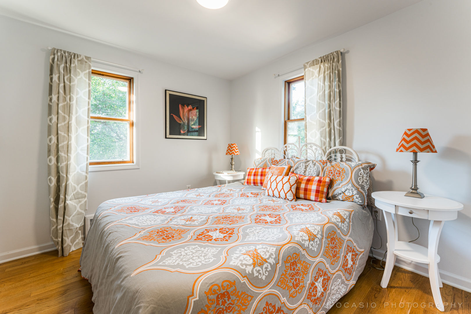 523 Kendall Lane DeKalb, IL 60115 - Photo 18 of 29 a bedroom with a bed and wooden floor