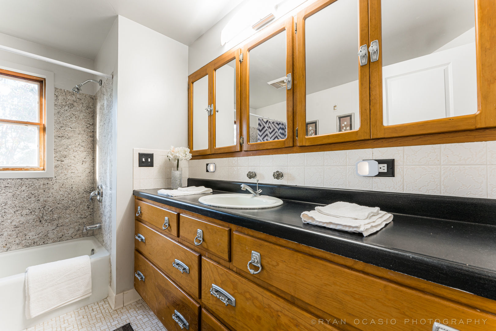 523 Kendall Lane DeKalb, IL 60115 - Photo 19 of 29 a bathroom with a granite countertop sink and a bathtub