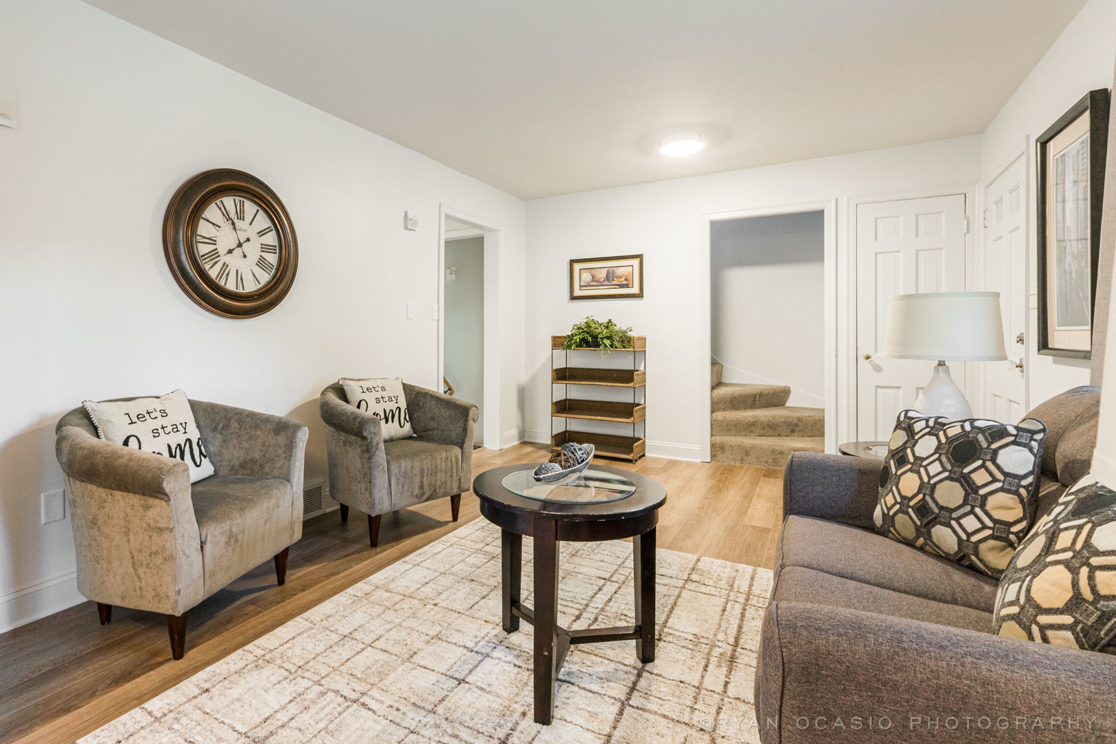 523 Kendall Lane DeKalb, IL 60115 - Photo 3 of 29 a living room with furniture a clock and a window