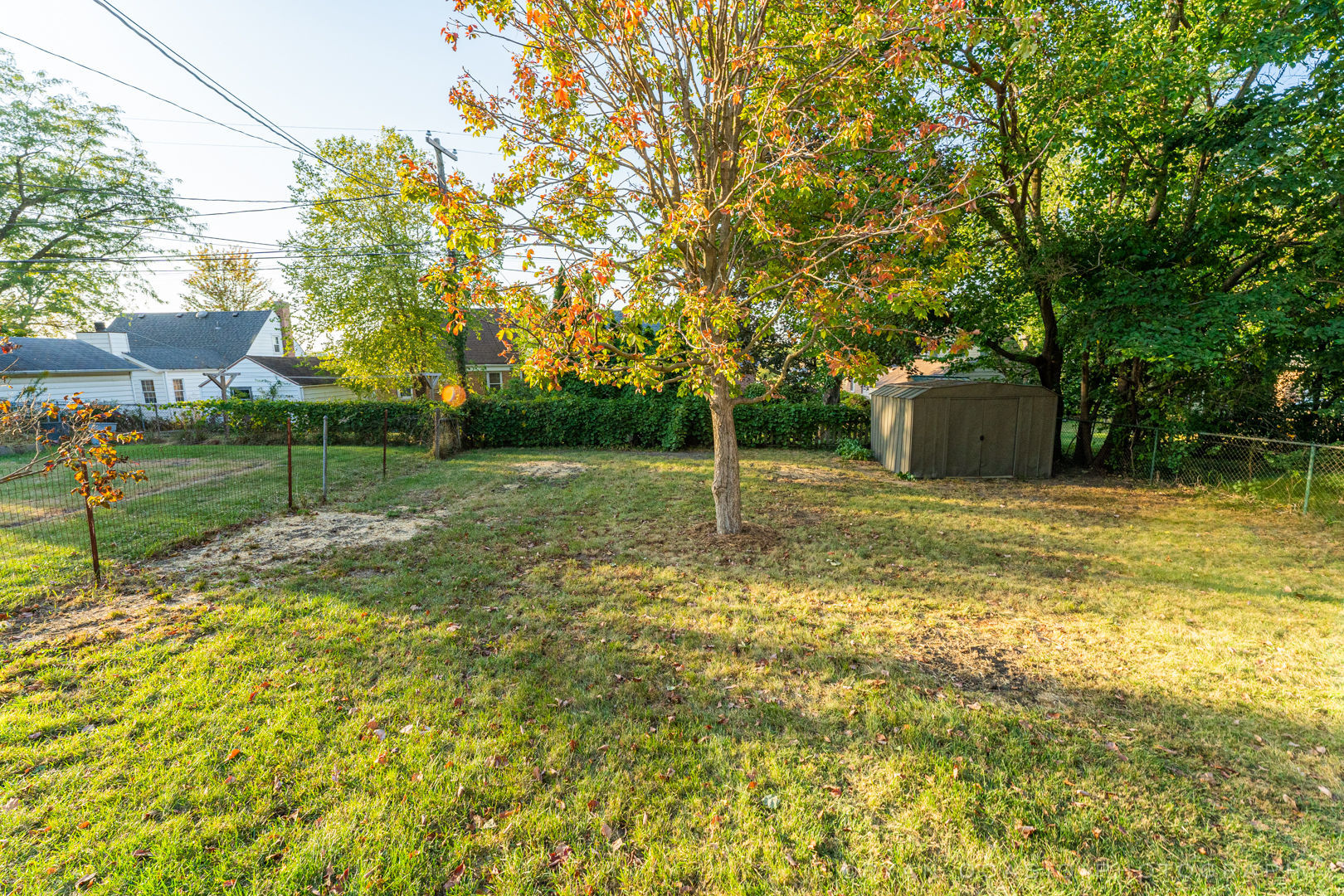 523 Kendall Lane DeKalb, IL 60115 - Photo 28 of 29 a view of a fountain in front of a house with a big yard