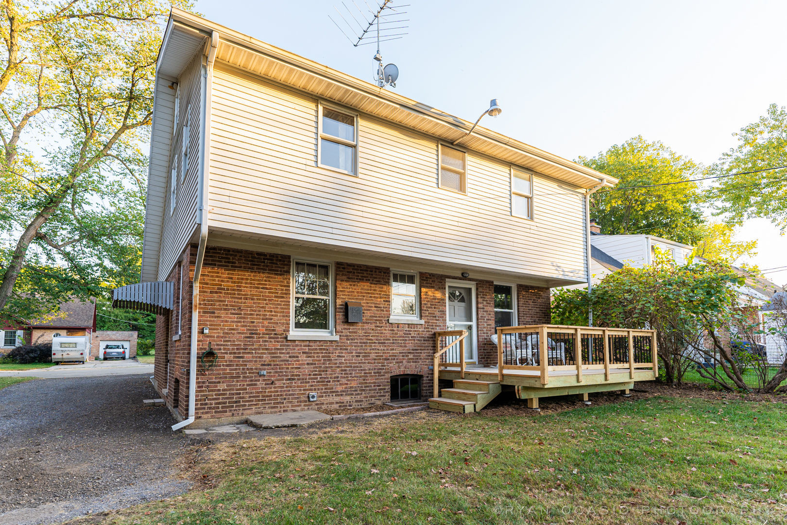 523 Kendall Lane DeKalb, IL 60115 - Photo 29 of 29 a front view of a house with a garden