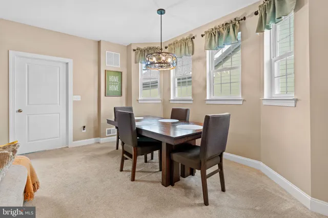a living room with a couch and a flat screen tv