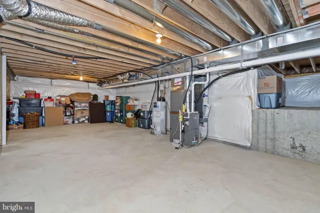a view of a kitchen with sink washer and dryer