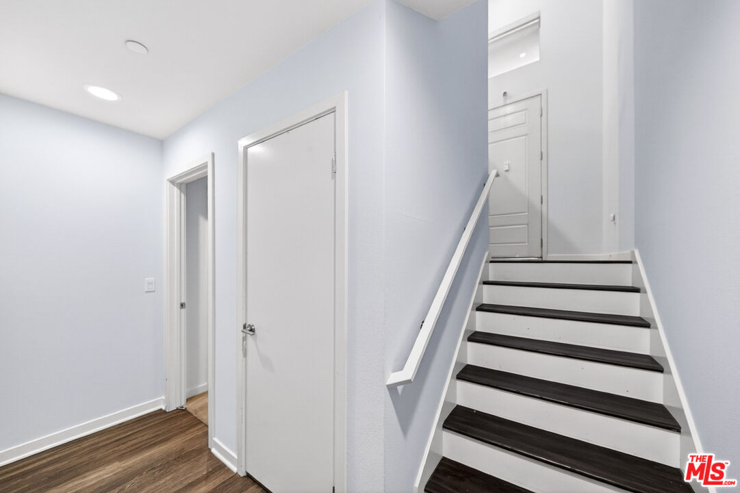 676 Colorado Circle Carson, CA 90745 - Photo 3 of 36 a view of entryway with wooden floor and stairs
