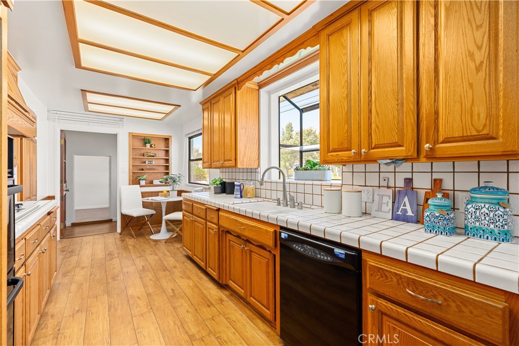 2701 Warren Way Arcadia, CA 91007 - Photo 12 of 30 a kitchen with stainless steel appliances granite countertop a sink and cabinets