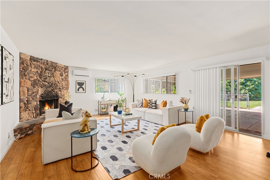 2701 Warren Way Arcadia, CA 91007 - Photo 21 of 30 a living room with fireplace furniture and a large window