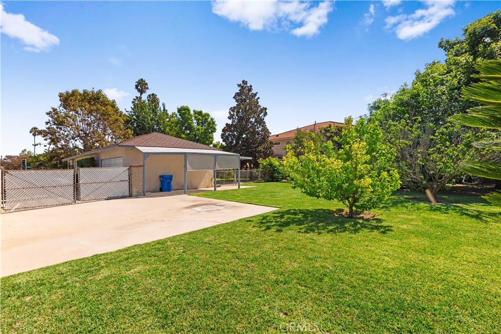 2701 Warren Way Arcadia, CA 91007 - Photo 26 of 30 a front view of a house with a yard and trees