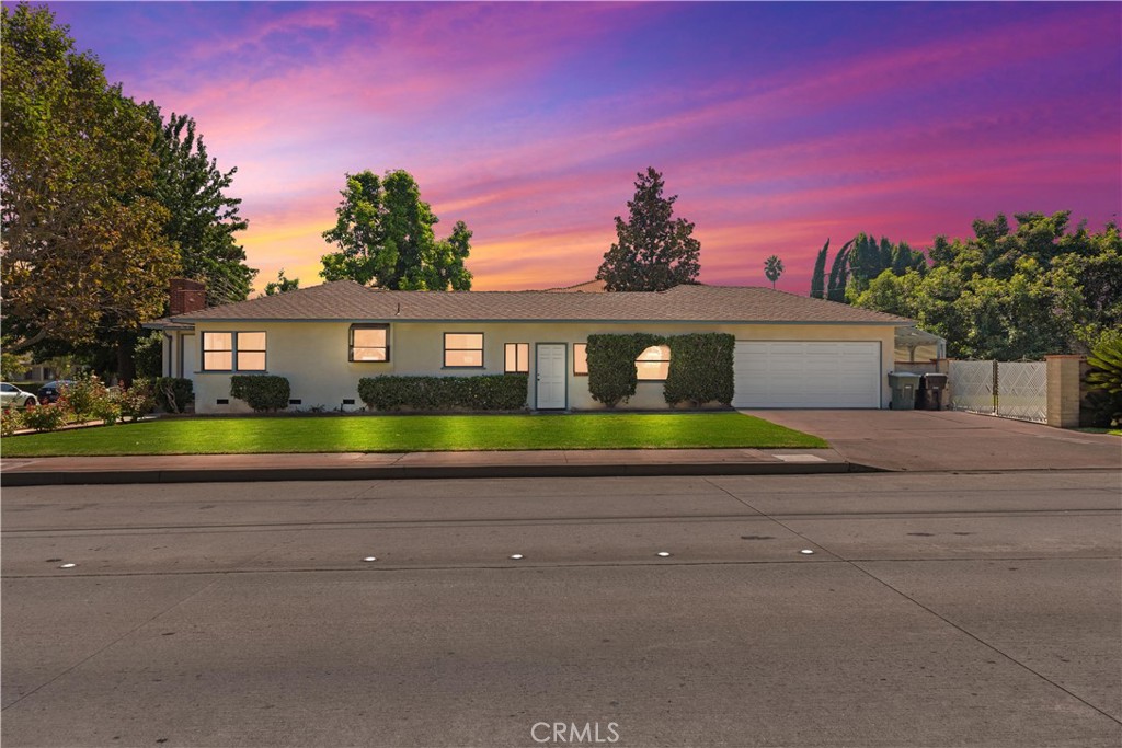 2701 Warren Way Arcadia, CA 91007 - Photo 29 of 30 a front view of a house with a yard and potted plants
