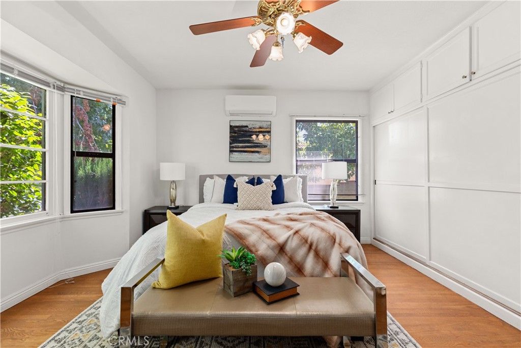 2701 Warren Way Arcadia, CA 91007 - Photo 9 of 30 a bedroom with a bed and wooden floor