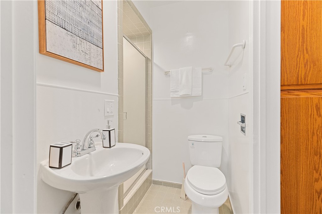 2701 Warren Way Arcadia, CA 91007 - Photo 10 of 30 a bathroom with a sink a toilet and a mirror