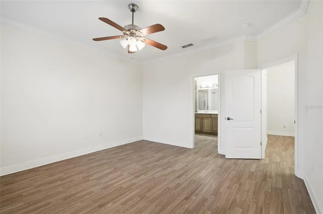 a bathroom with a double vanity sink and mirror