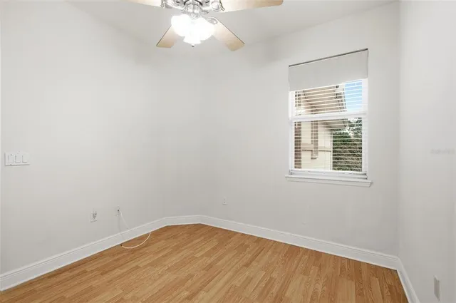 an aerial view of a house with a lake view