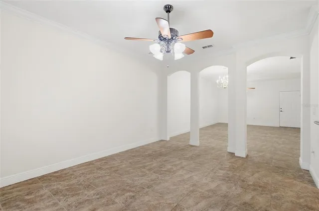 a view of a room with a flat screen tv