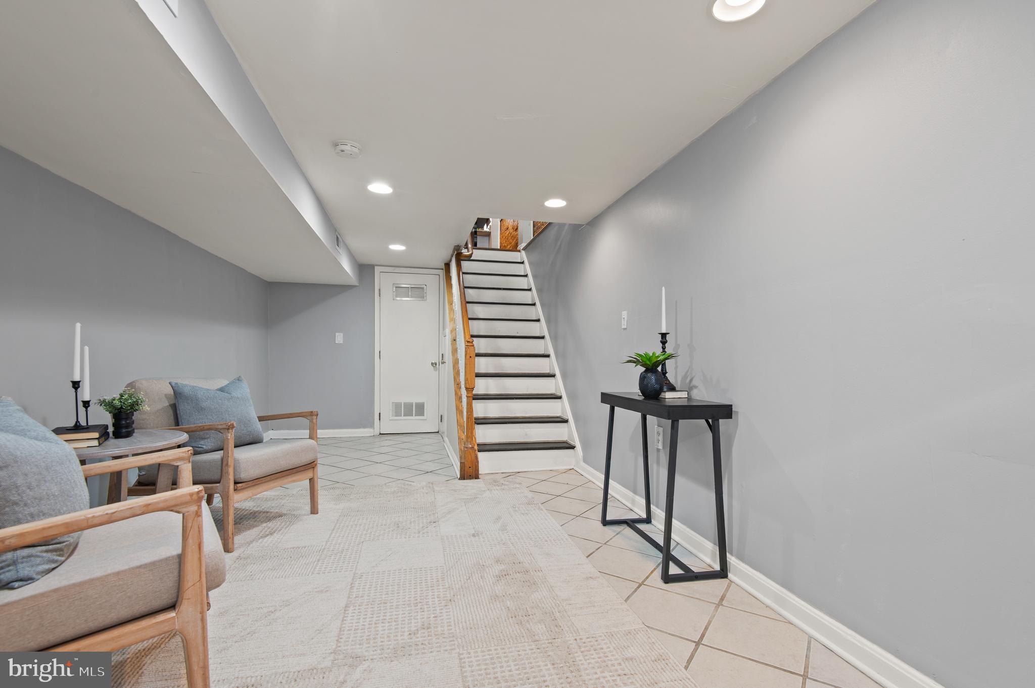 1236 Sargeant Street Baltimore, MD 21223 - Photo 17 of 19 a view of a hallway with seating area
