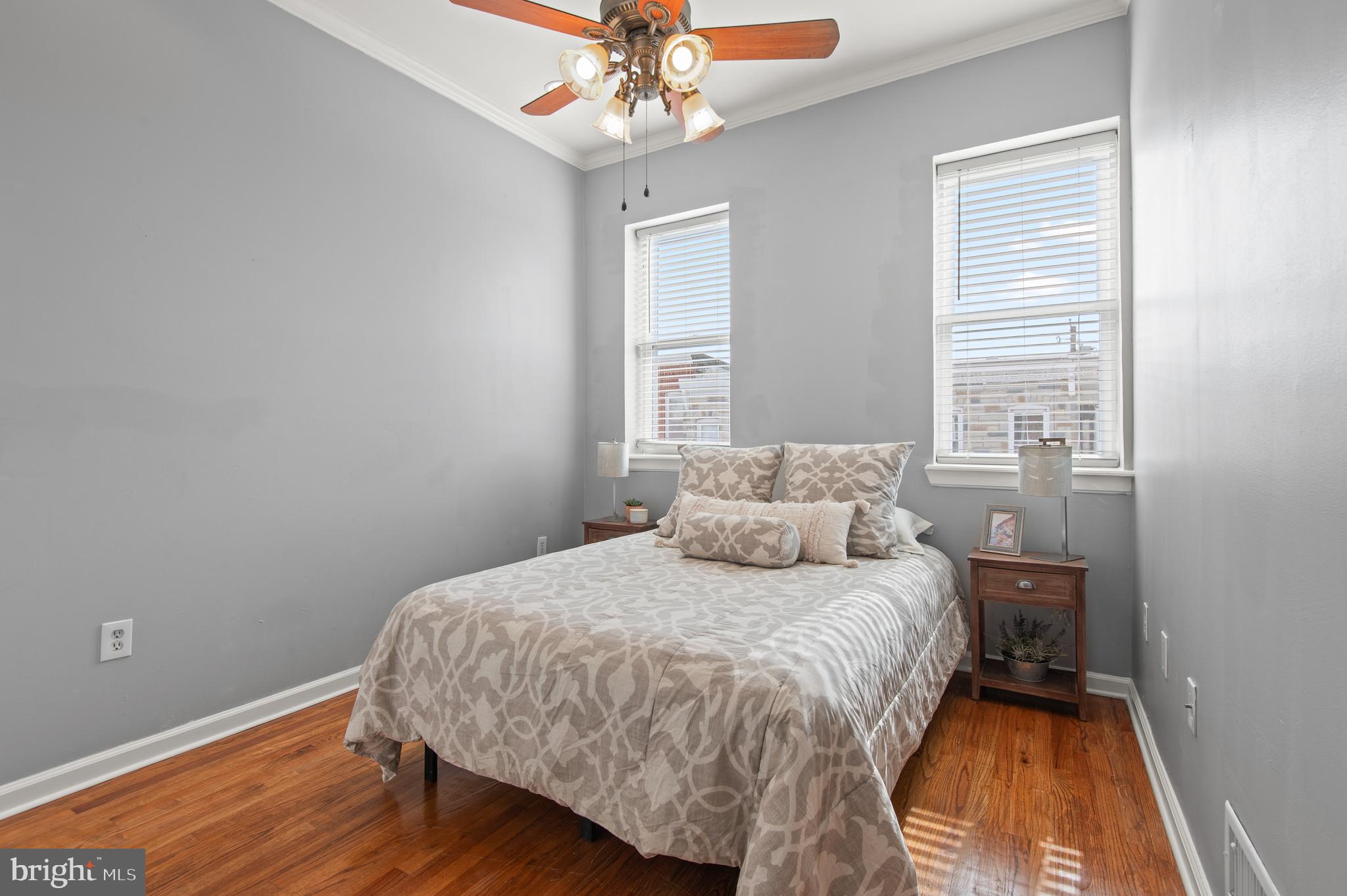 1236 Sargeant Street Baltimore, MD 21223 - Photo 10 of 19 a bedroom with a bed and a window