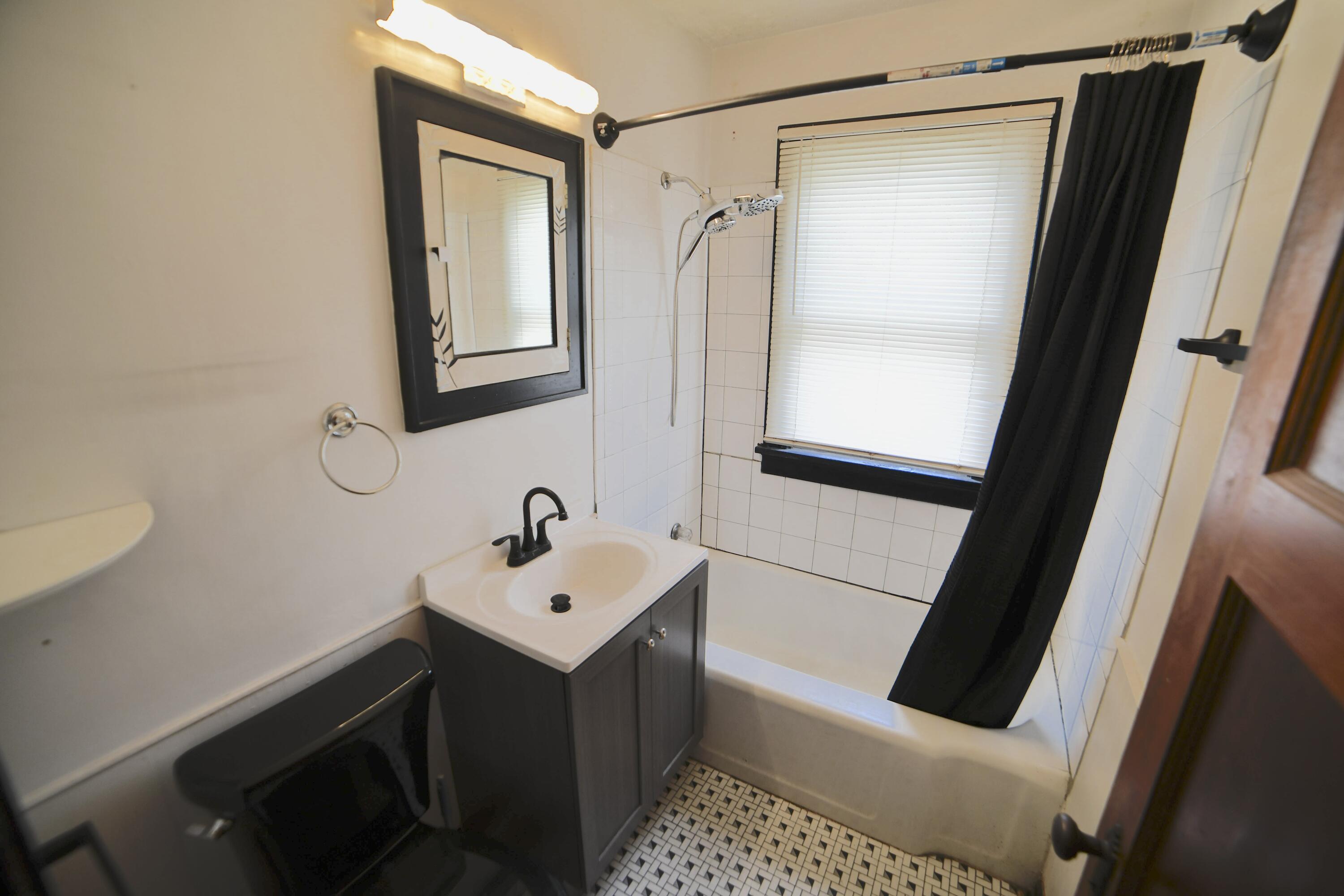5931 North 84th Street, Unit A Milwaukee, WI 53225 - Photo 9 of 22 Downstairs Bathroomo