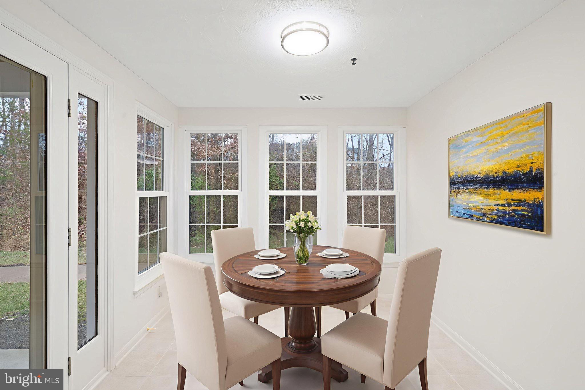 1404 Golden Rod Court, Unit B Belcamp, MD 21017 - Photo 12 of 25 a view of a dining room with a table and chairs