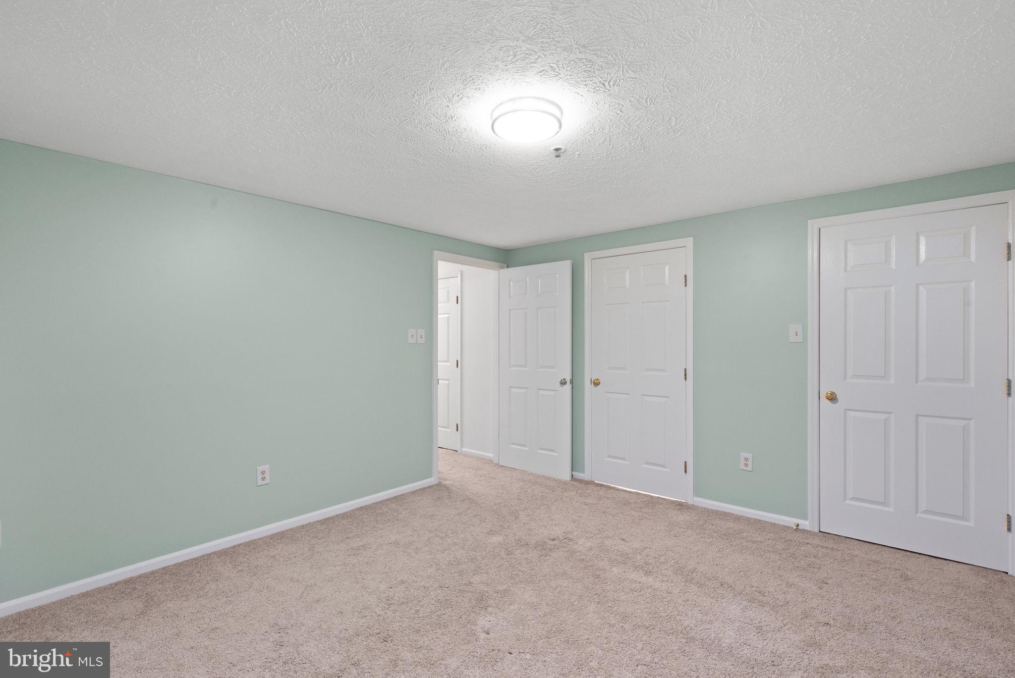 1404 Golden Rod Court, Unit B Belcamp, MD 21017 - Photo 19 of 25 a view of an empty room and a window