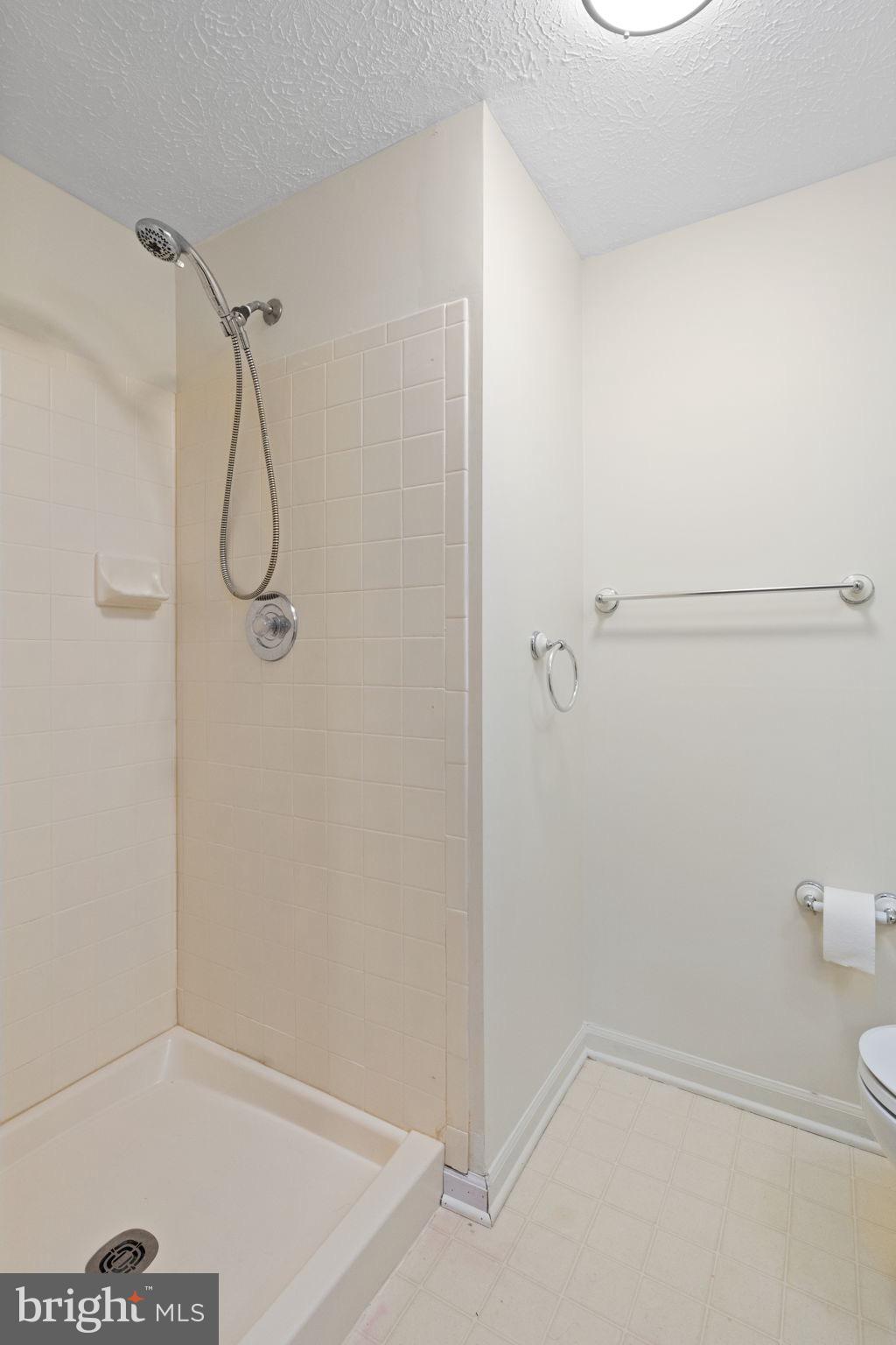 1404 Golden Rod Court, Unit B Belcamp, MD 21017 - Photo 21 of 25 a bathroom with a shower