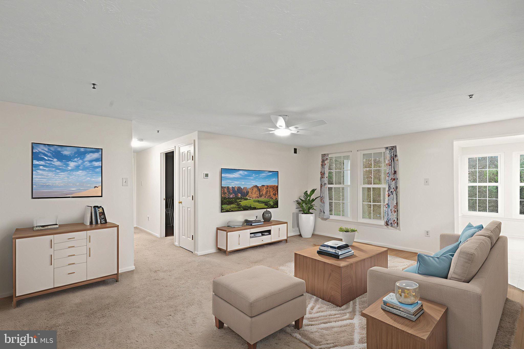 1404 Golden Rod Court, Unit B Belcamp, MD 21017 - Photo 4 of 25 a living room with furniture and a flat screen tv