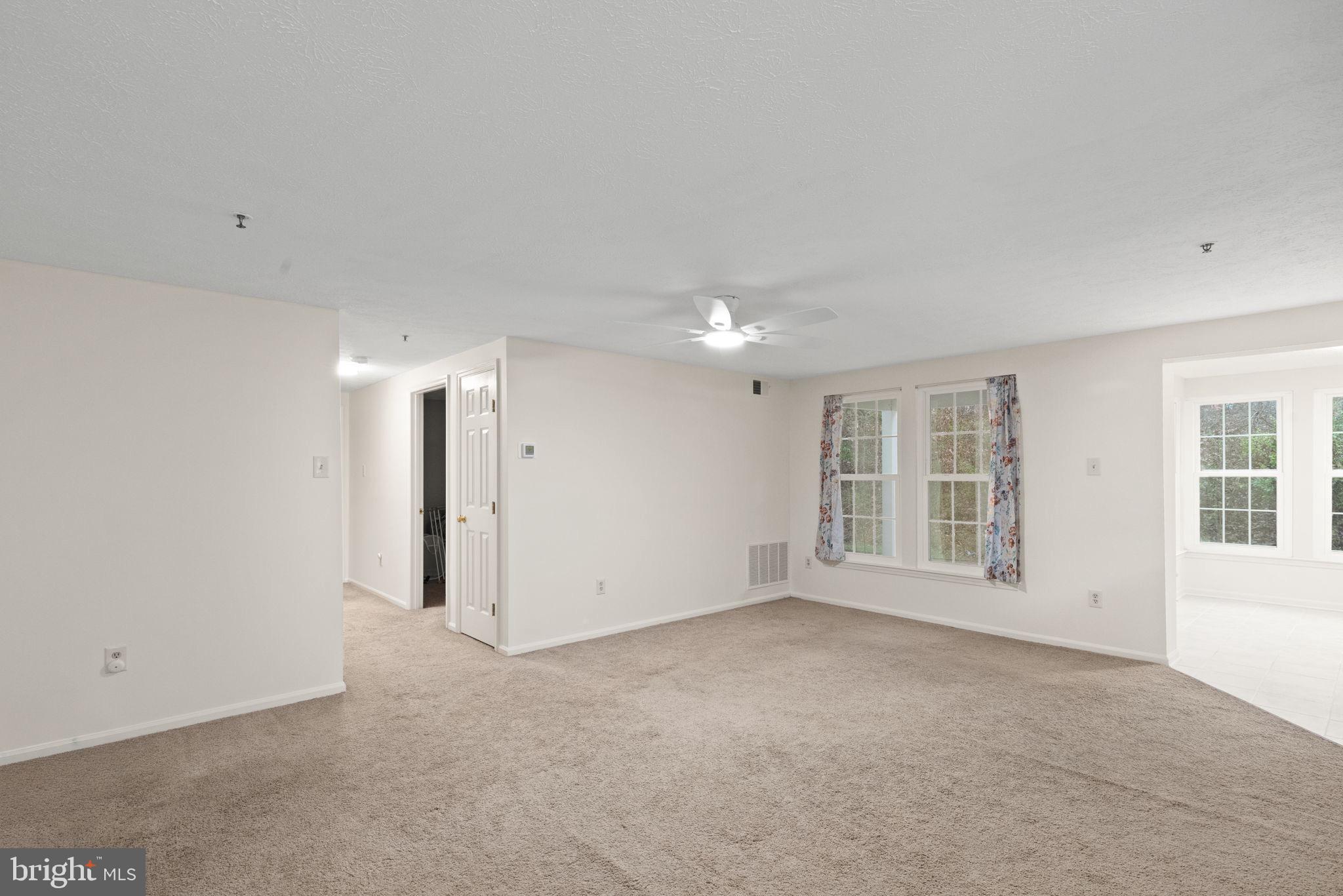 1404 Golden Rod Court, Unit B Belcamp, MD 21017 - Photo 5 of 25 a view of an empty room with a window
