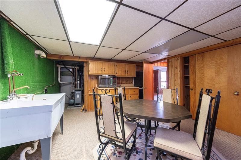 719 Locust Street Greensburg, PA 15601 - Photo 13 of 18 a view of a dining room with furniture and a livingroom