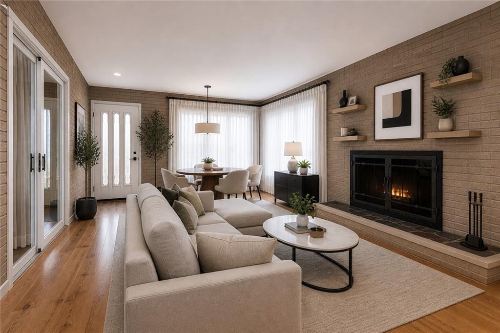 719 Locust Street Greensburg, PA 15601 - Photo 8 of 18 a living room with furniture and a fireplace