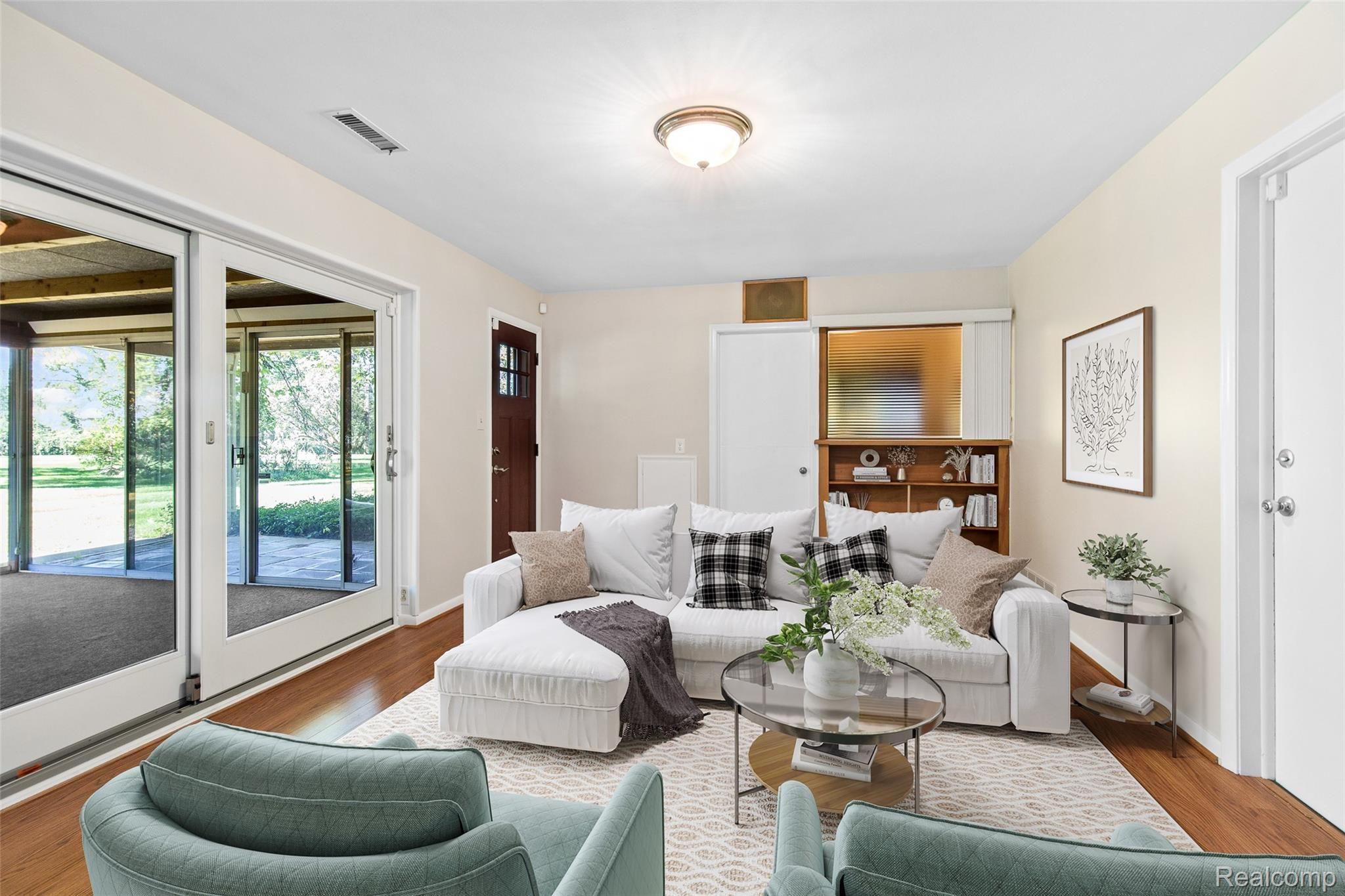 2866 Acorn Road Bloomfield Hills, MI 48302 - Photo 8 of 17 Family Room Opens to Sunroom