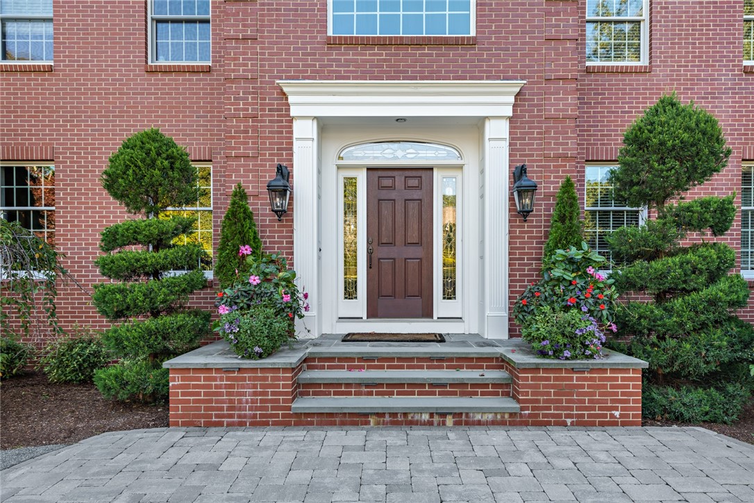 Front entry landing and stairs were recently replaced, in addition to new pavers at the entry way.