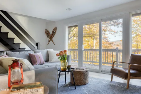 a view of a chair and table in the balcony