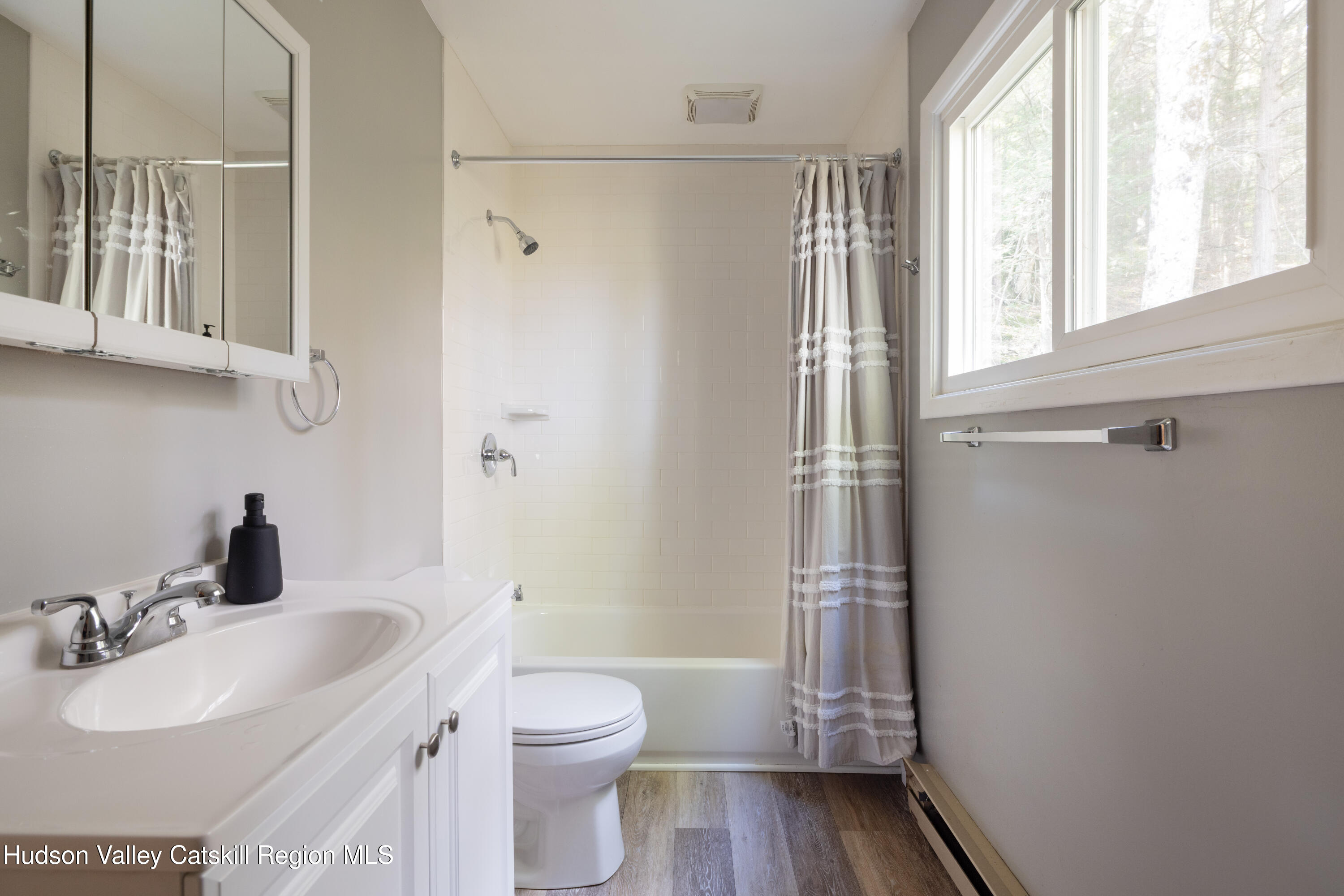6 Clearview Road Hunter, NY 12442 - Photo 24 of 31 a bathroom with a sink toilet and shower
